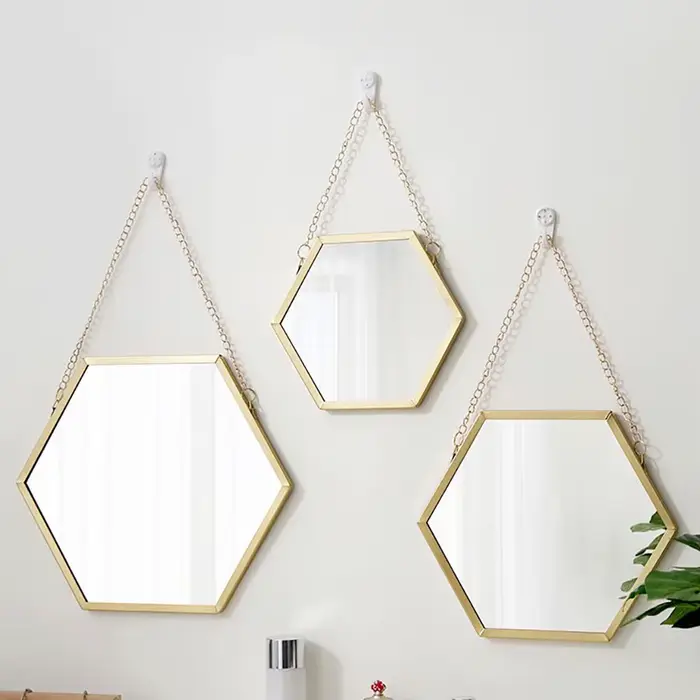 Miroir mural hexagonal en fer