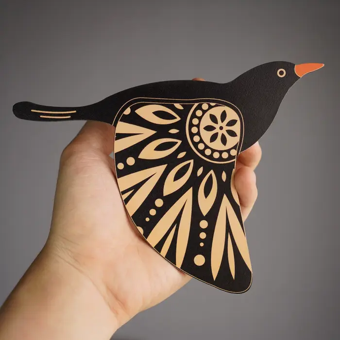 Décoration murale en bois d'oiseau noir