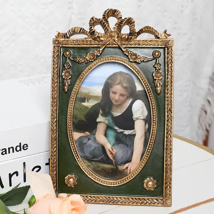 Cadre photo sculpté doré