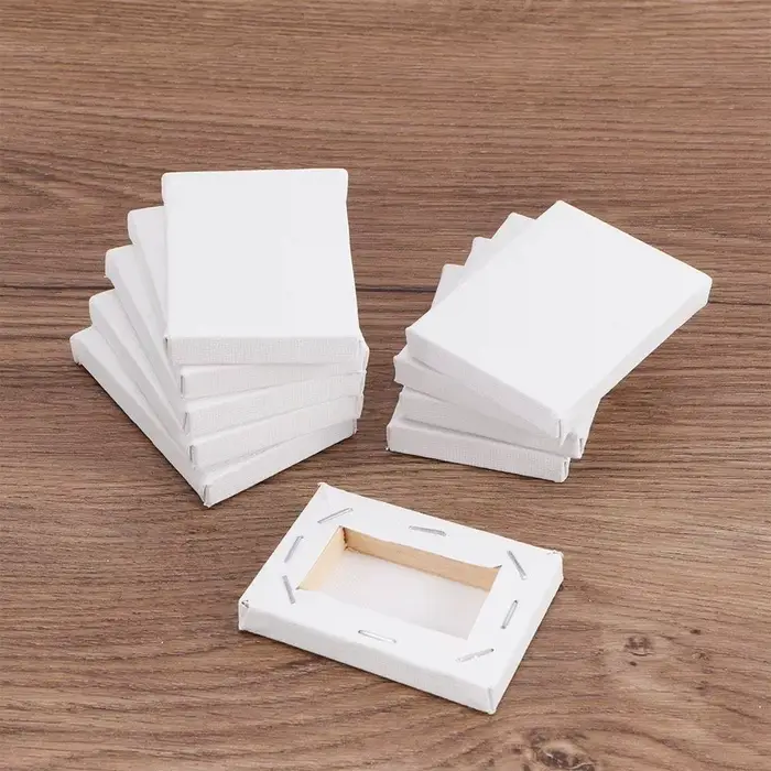 Petit cadre en bois blanc pour toile d'artiste